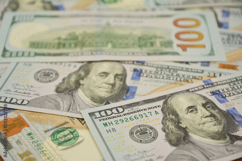 100 Dollars bill and portrait Benjamin Franklin on USA money banknote. Earning money and saveing money concept photo. 100 Dollars bill and portrait Benjamin Franklin on USA money banknote. Earning money and saveing money concept photo.