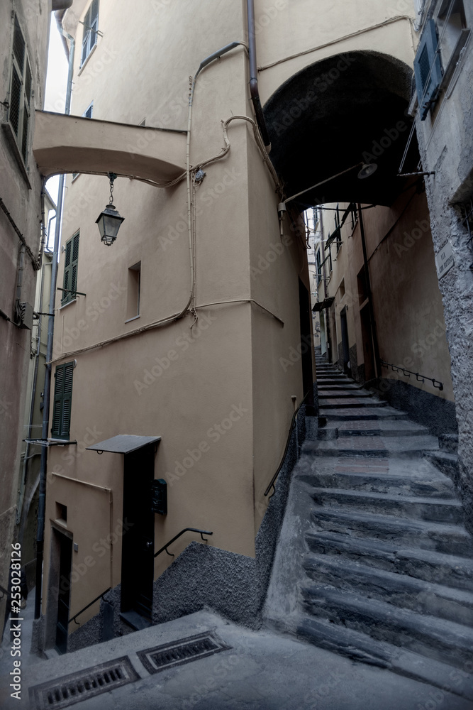 Typical Italian narrow street, Vernazza village, Cinque Terre, Italian Riviera