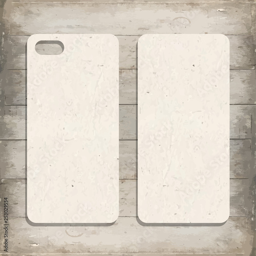 Mobile phone cover template on wooden background