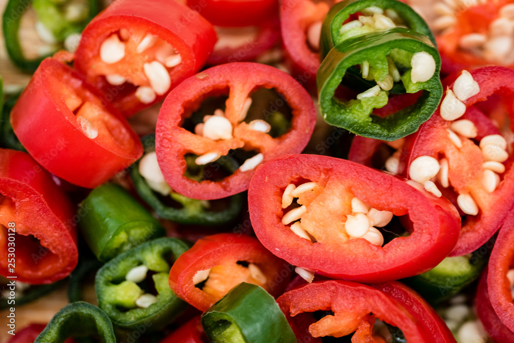 sliced red and green chillies close up sliced red and green chillies close up