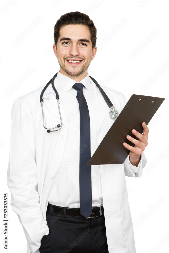 Got some health news. Vertical studio shot of a handsome doctor holding a clipboard isolated on white