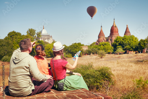 Happy travelers, friends, vacationers in the summer holidays in Bagan, Myanmar. photo