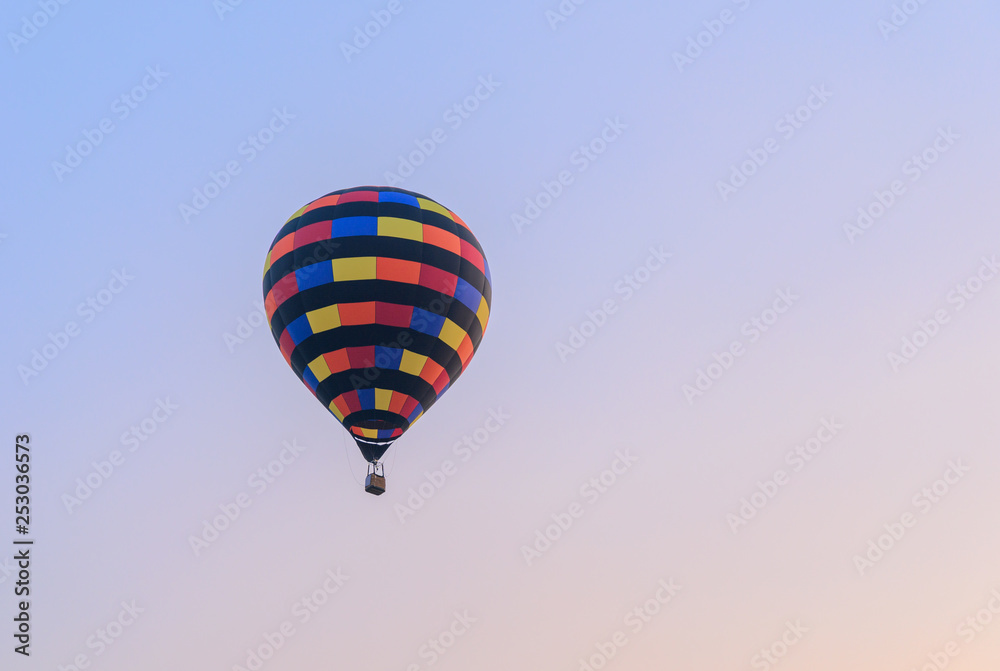 Hot air balloon flying on sky