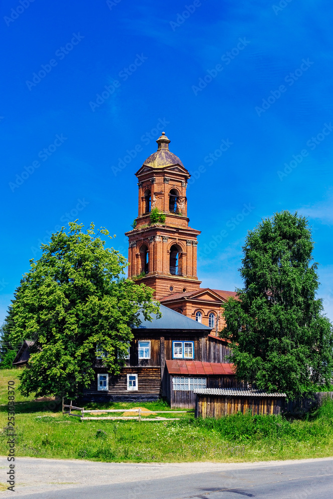 old church with a bell tower in the village