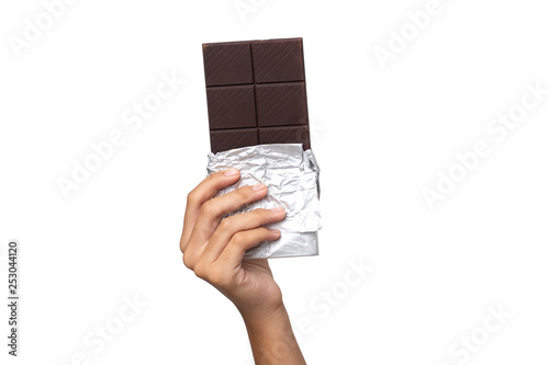 Bild auf Leinwand Close-up hand holding Chocolate isolated on a White Background