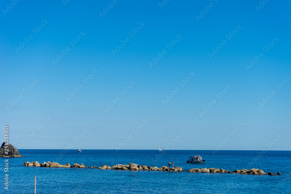 Italy, Cinque Terre, Monterosso, a large body of water next to the ocean