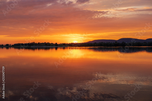 Sunset on a lake in Hohenrode in Germany