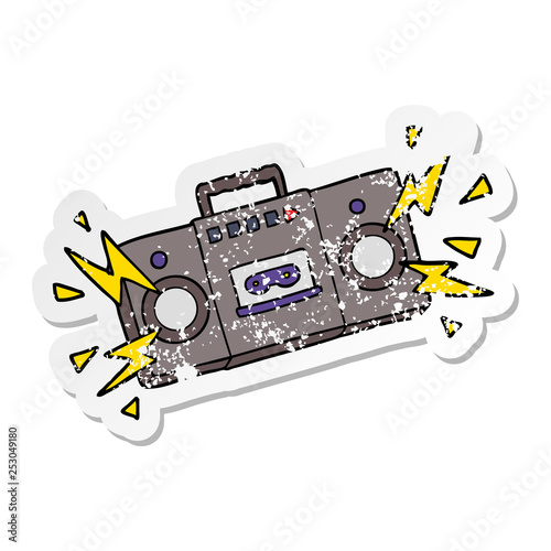 distressed sticker of a retro cartoon tape cassette player blasting out old rock tunes