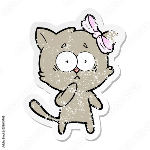 distressed sticker of a cartoon cat