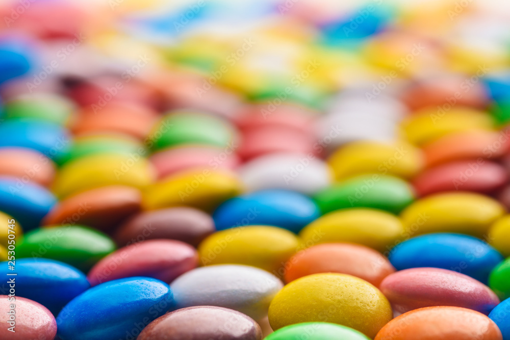 colored round candy scattered on the table close-up colored round candy scattered on the table close-up