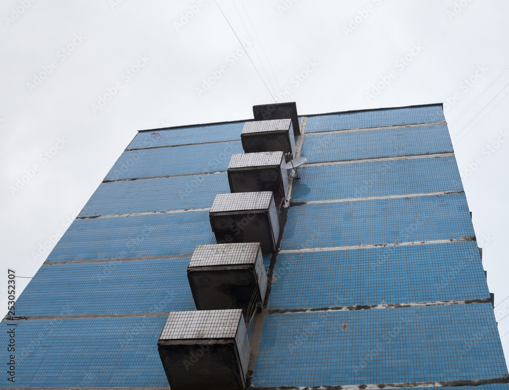 Balconies on the wall of the old high-rise building. Balconies on the wall of the old high-rise building.