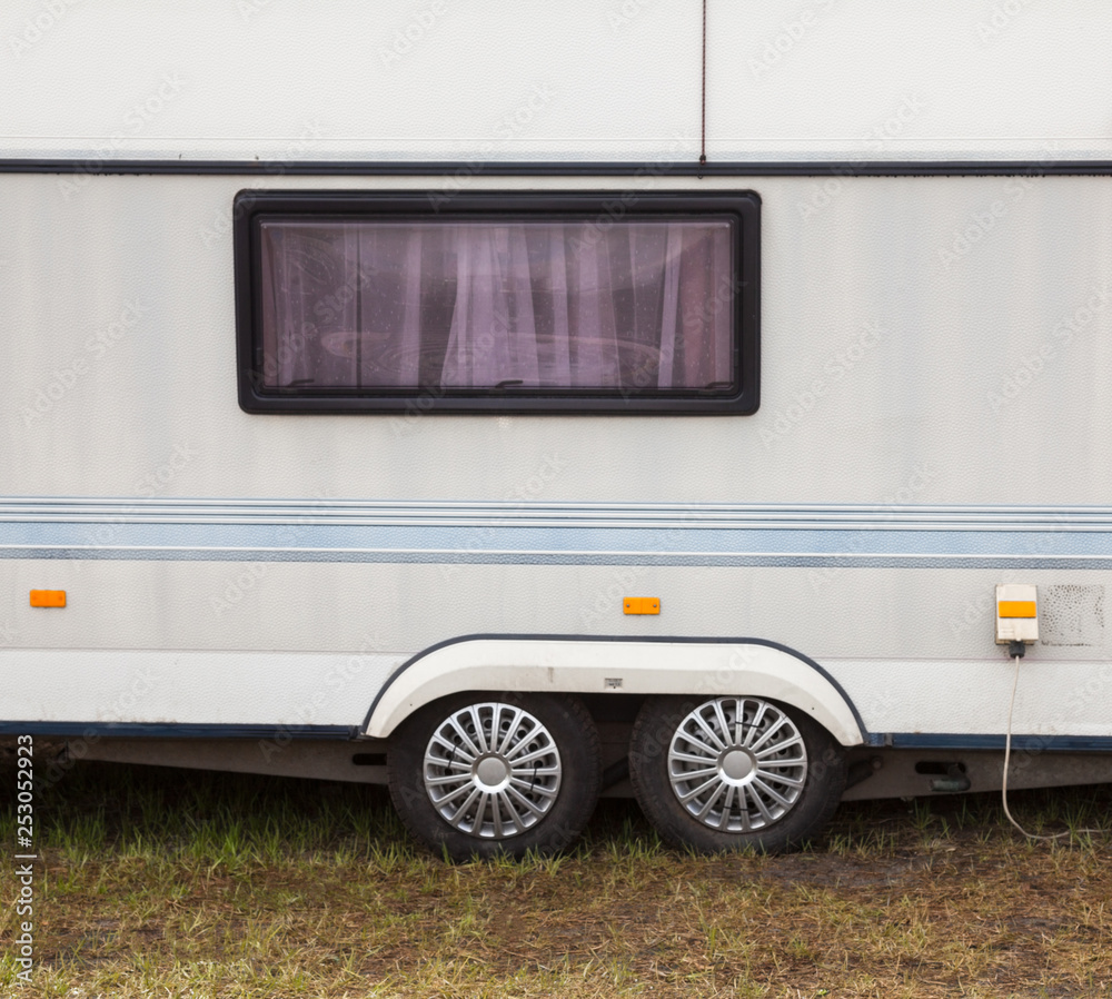 A travel trailer (camper trailer, caravan).