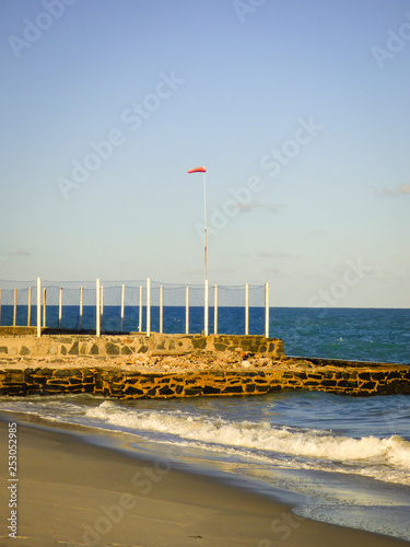 Wind direction indicator (windstock) from the Marina at Forno da Cal beach on Itamaraca Island - Pernambuco state, Brazil photo