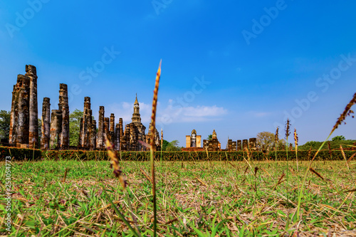 Sukhothai historical park and surrounding area example Wat Si Chum, Wat Traphang-Thong, Sorasak Temple in the midday and twilight photo