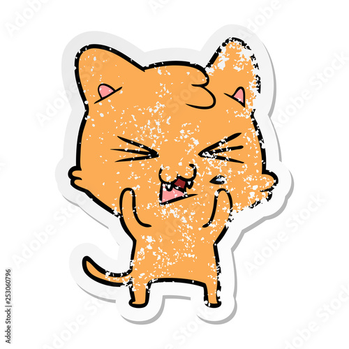 distressed sticker of a cartoon hissing cat