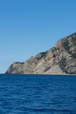 Italy, Cinque Terre, Monterosso, Monterosso al Mare, SCENIC VIEW OF SEA AND MOUNTAIN AGAINST CLEAR BLUE SKY