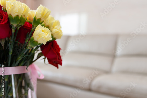 house indoor with beautiful roses and carnations