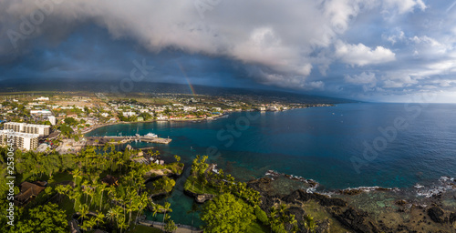 Aerial panorama of the city of Kailua Kona with rainbow in the sky. Big Island, Hawaii photo