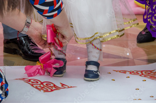 Tusau Keser - Kazakh tradition to celebrate a toddler's first steps photo