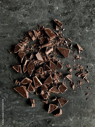 chopped dark chocolate on dark background
