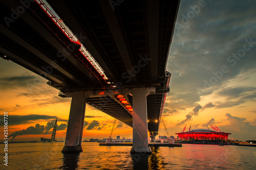 St. Petersburg. Russia. Peter Highway. Expressway on stilts. Summer sunset from the Neva. Lakhta Center. Stadium Zenit Arena. Modern architecture of St. Petersburg. Cities of Russia.