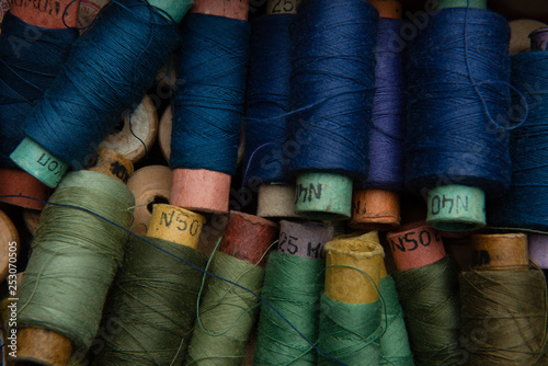 group of multicolored threads top view