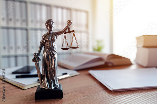 Photo Lady Justice statue in law firm office