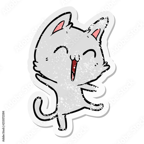 distressed sticker of a happy cartoon cat meowing