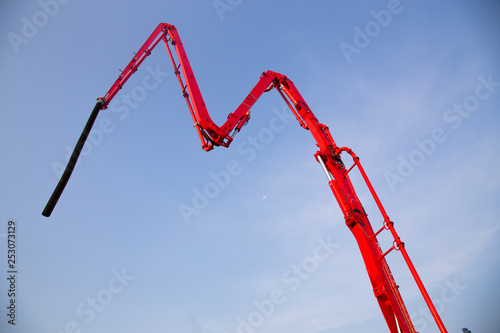 High arms of crane in building site