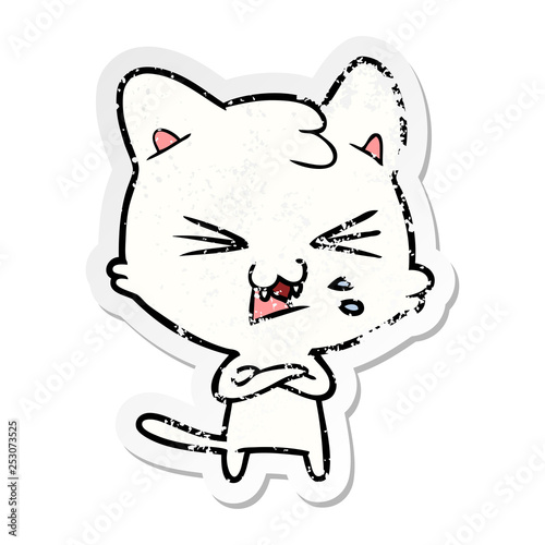 distressed sticker of a cartoon hissing cat