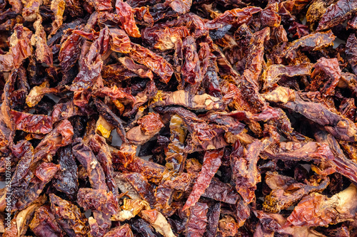 Slices of sun dried tomatoes backgro