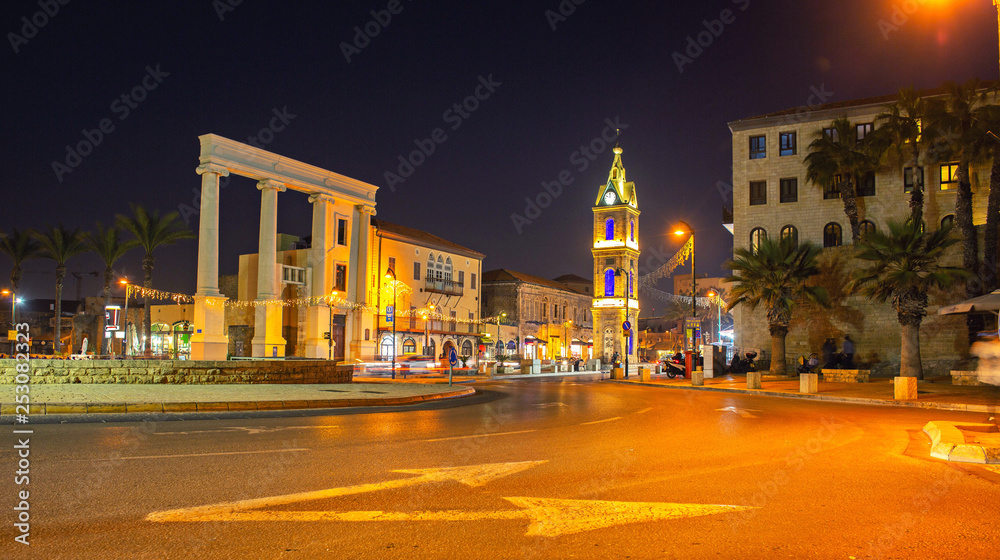 Old Jaffa clock tower town square at night