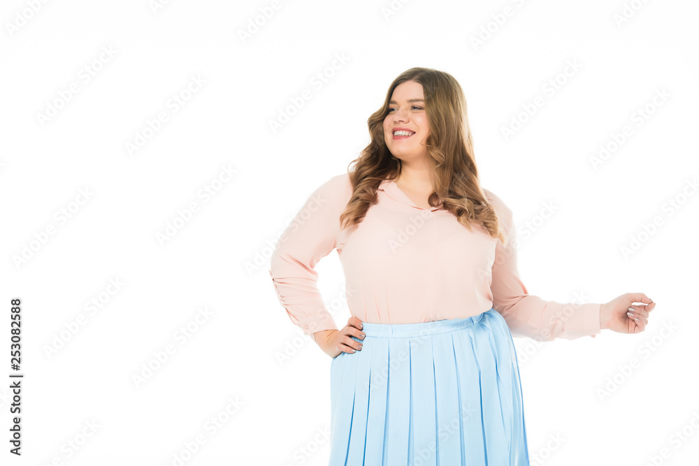 happy smiling elegant overweight woman with hand on hip looking away isolated on white happy smiling elegant overweight woman with hand on hip looking away isolated on white