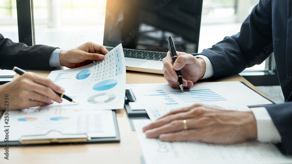 Brainstorming Group Working Concept. Business People or Startup teamwork Coworker discussing work plan documents and idea with colleague in office Brainstorming Group Working Concept. Business People or Startup teamwork Coworker discussing work plan documents and idea with colleague in office