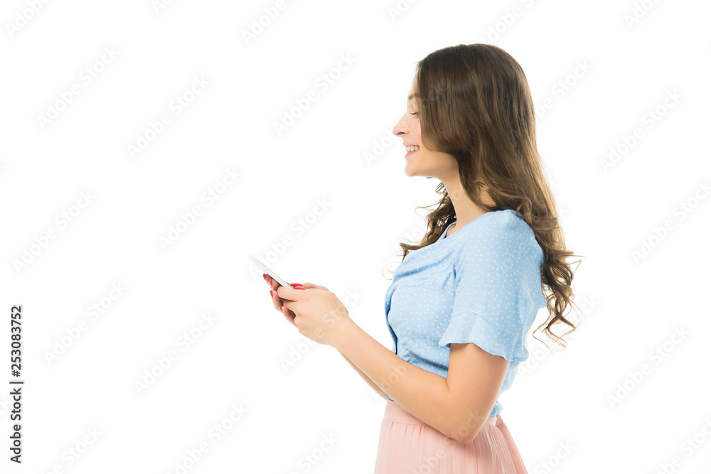 smiling beautiful girl typing on smartphone isolated on white smiling beautiful girl typing on smartphone isolated on white