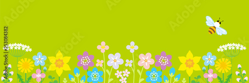 Naklejka Lined up Colorful Wildflowers and honey bee, header ratio - Green color background