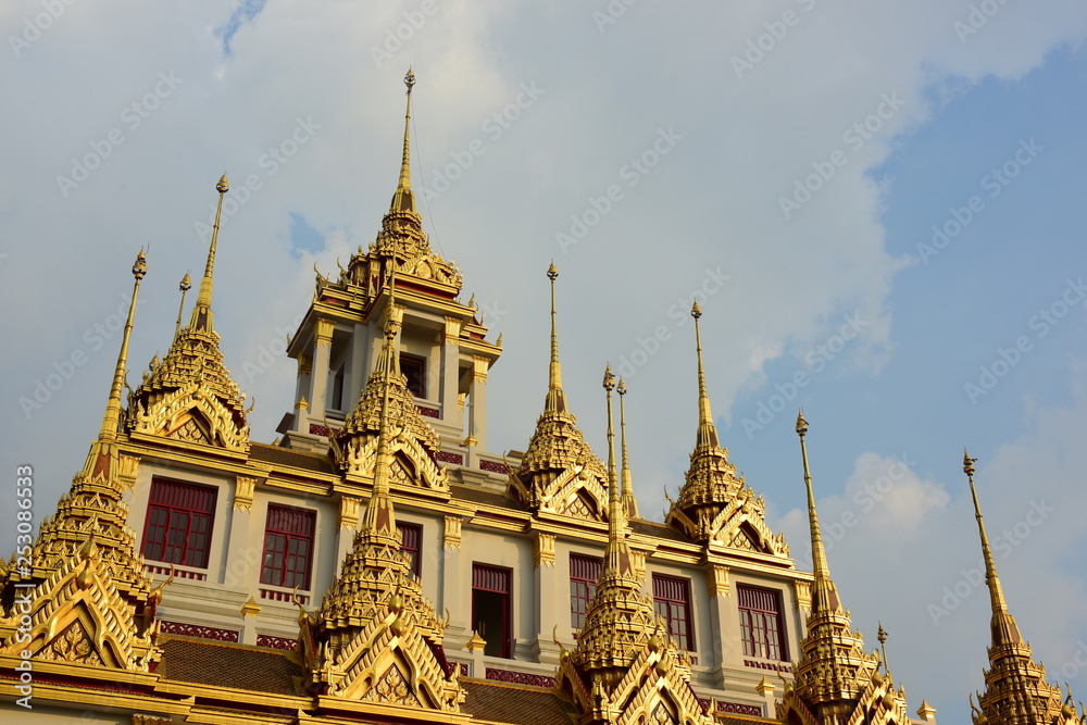 Fototapeta premium A beautiful temple with clear sky in Thailand. Temple was built in many years ago with unique Thai style