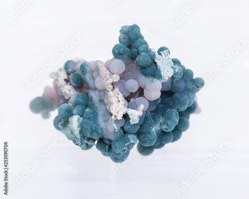 Grape Agate Clusters from Indonesia isolated on white Selenite background.