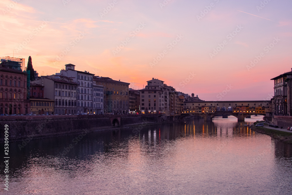 florence,tuscany/Italy 20 february 2019 : the ponte vechio bridge snapshot taken at golden hour beautiful colors and excellent architecture