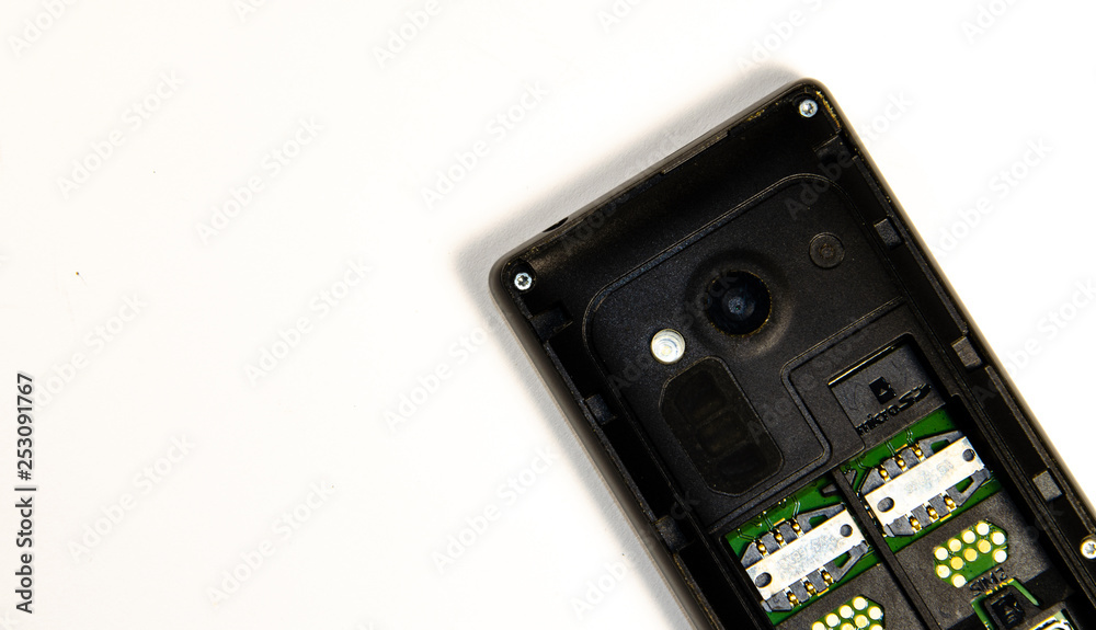 Interiors, details of a button phone, a smartphone in macro Interiors, details of a button phone, a smartphone in macro