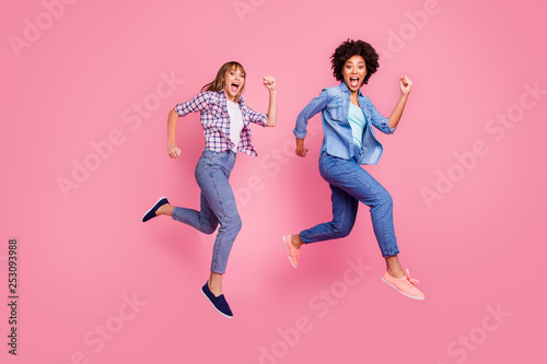 Full length body size view of two person nice-looking cool attractive charming cheerful funny crazy funky girls running fast isolated over pink pastel background