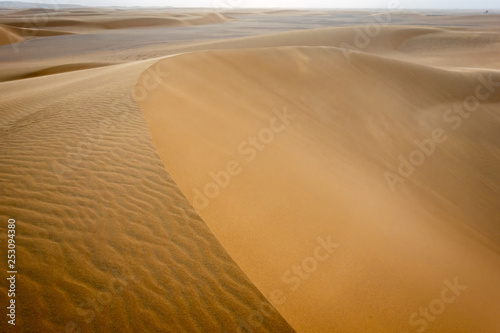 Abstract image of the surface of a sloping dune in the Sahara in Sudan