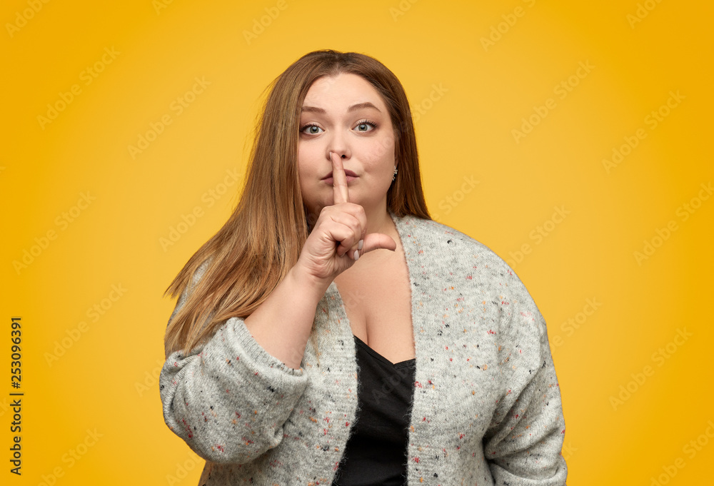 Plump woman asking to be quiet Plump woman asking to be quiet