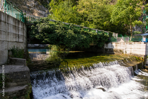 a small artificial waterfall flowing from the lake of karst origin, located in the Republic of Abkhazia on the 13th kilometer of the road to lake Ritsa, on the right Bank of the river Bzyb