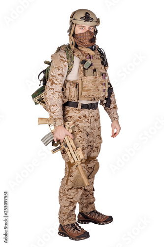 Special forces soldier with rifle on white background. army, military and people concept