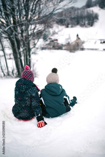Two kids on snow