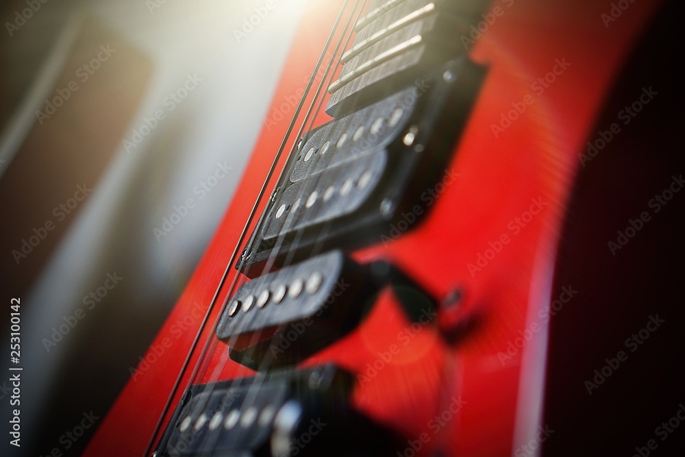 Close-up electric guitar sunbeams musical card.