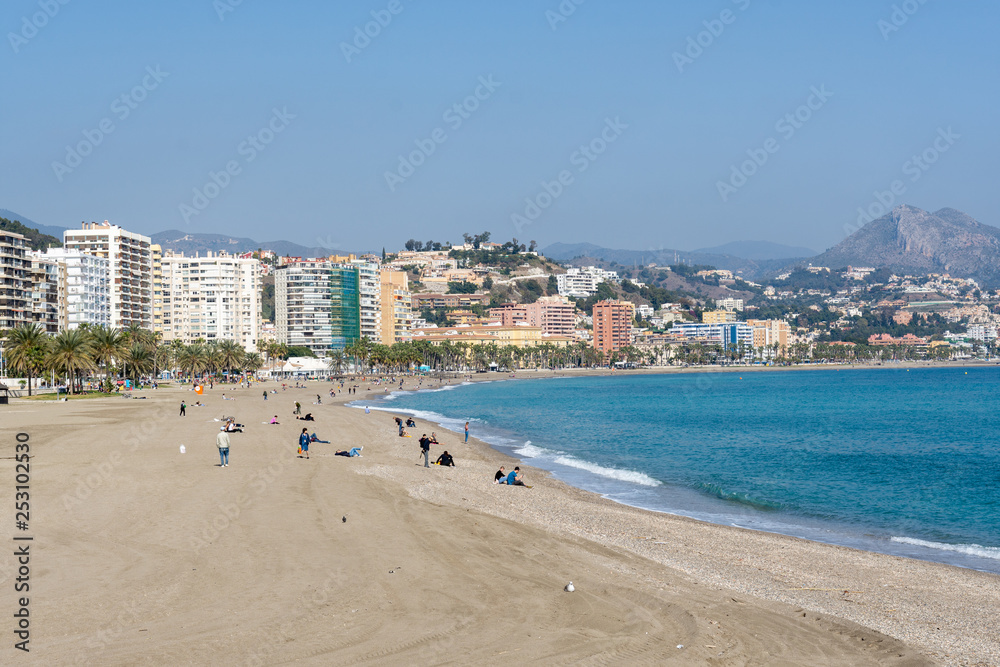 Malaga beach seen from the harbor on a sunny day