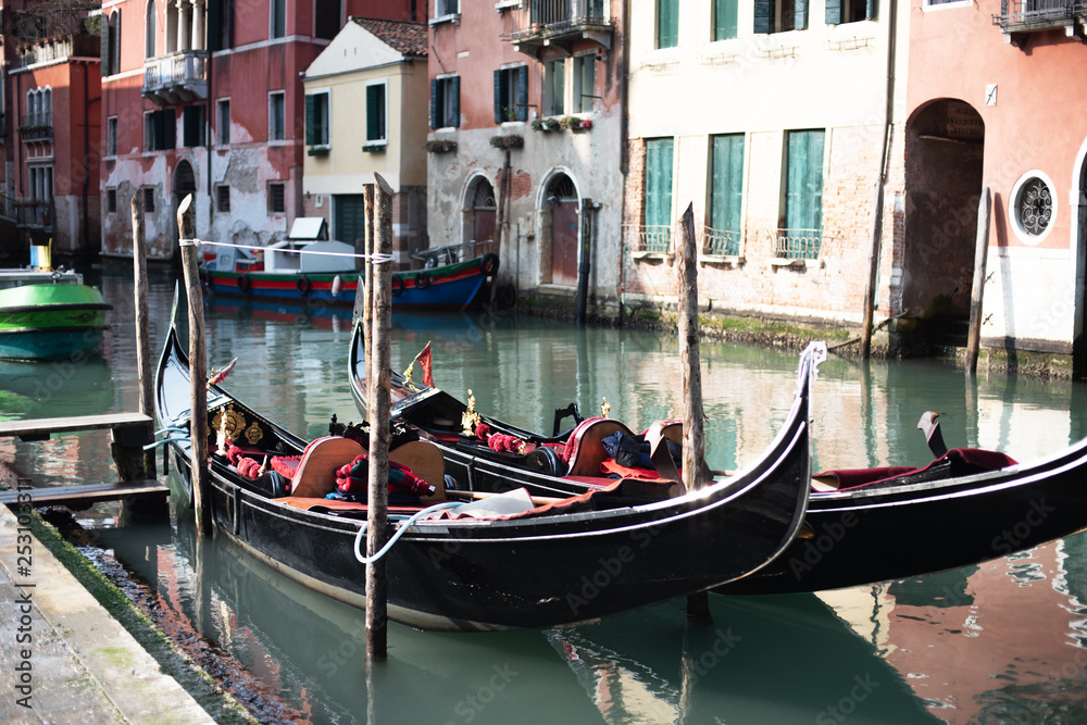 Canal with two gondolas in Venice, Italy. Architecture and landmarks of Venice. Venice postcard with Venice gondolas Canal with two gondolas in Venice, Italy. Architecture and landmarks of Venice. Venice postcard with Venice gondolas