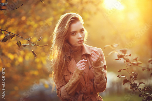 Young female model in autumn park